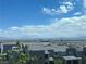 Great community view overlooking neighborhood homes, trees, and city skyline at 492 Pear Lake St, Las Vegas, NV 89138