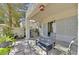 Back yard featuring covered patio and seating at 4932 Forest Oaks Dr, Las Vegas, NV 89149