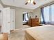 Bedroom with carpeted floor, and sliding mirrored closet doors at 5120 First Sun St, North Las Vegas, NV 89081
