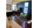 Inviting living room with hardwood floors, neutral paint, and a comfortable seating area at 5120 First Sun St, North Las Vegas, NV 89081