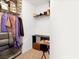 Walk-in closet with installed shelving, hanging rack, and space for desk at 5120 First Sun St, North Las Vegas, NV 89081