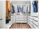 Spacious walk-in closet with custom shelving and ample storage for clothing and accessories at 5227 Zebra Ct, North Las Vegas, NV 89031