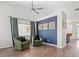 Living room featuring hardwood floors, comfortable seating, and stylish décor at 5227 Zebra Ct, North Las Vegas, NV 89031