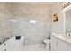 Modern bathroom with sleek fixtures, elegant marble tile, and luxurious tub at 5415 W Harmon Ave # 1074, Las Vegas, NV 89103