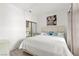 Comfortable bedroom featuring a queen bed, soft bedding, and natural lighting at 5415 W Harmon Ave # 1074, Las Vegas, NV 89103
