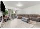 Cozy living room with modern fireplace, neutral tones and balcony access at 5415 W Harmon Ave # 1074, Las Vegas, NV 89103