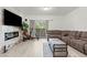 Comfortable living room featuring modern fireplace and neutral tones at 5415 W Harmon Ave # 1074, Las Vegas, NV 89103
