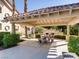 Outdoor picnic area featuring a covered gazebo and manicured landscaping perfect for community gatherings at 5415 W Harmon Ave # 1074, Las Vegas, NV 89103