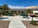 Outdoor recreation space featuring bench, picnic table, and grill, ideal for community gatherings at 545 Thea St # 1315, Henderson, NV 89052