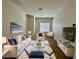 Bright living room with plush rug and white furniture provides a cozy atmosphere at 545 Thea St # 1315, Henderson, NV 89052
