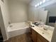 Bathroom featuring a separate shower and soaking tub, perfect for unwinding after a long day at 5650 E Sahara Ave # 1035, Las Vegas, NV 89142