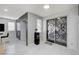 Open living area showcasing modern design, fireplace, and sliding glass door at 6538 Astorville Ct, Las Vegas, NV 89110
