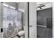 A half bathroom connects to a bedroom with a ceiling fan, offering convenience and privacy at 6971 Moaning Cavern St, Las Vegas, NV 89131