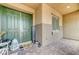 Inviting covered front porch with double doors and decorative welcome sign at 6971 Moaning Cavern St, Las Vegas, NV 89131