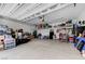 Spacious garage with ample storage space and organization, showcasing the potential for parking and projects at 6971 Moaning Cavern St, Las Vegas, NV 89131