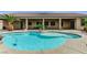 Beautiful pool and patio area is perfect for relaxation and entertaining with ample space and desert landscaping at 6971 Moaning Cavern St, Las Vegas, NV 89131
