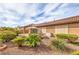 Low-maintenance backyard with privacy landscaping, a patio, and a covered outdoor dining area at 7264 Summer Duck Way, North Las Vegas, NV 89084