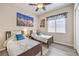 Clean bedroom with twin beds, carpet, and ceiling fan at 7264 Summer Duck Way, North Las Vegas, NV 89084