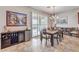A dining area boasting a modern table set and wine bar at 7264 Summer Duck Way, North Las Vegas, NV 89084