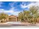 Charming single story home with a three car garage and mature landscaping at 7264 Summer Duck Way, North Las Vegas, NV 89084