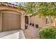 Charming front door with desert landscaping and a covered walkway at 7264 Summer Duck Way, North Las Vegas, NV 89084