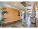 Inviting lobby with stylish decor, comfortable seating and tiled floors to welcome guests at 7264 Summer Duck Way, North Las Vegas, NV 89084