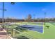 Brightly lit outdoor pickleball court with multiple courts for plenty of play time at 7264 Summer Duck Way, North Las Vegas, NV 89084