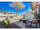 Picturesque patio view featuring outdoor seating, natural light, and landscaping, offering a private retreat at 775 Cathy Ln, Henderson, NV 89015
