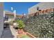 Inviting patio area featuring stylish seating, vibrant greenery, and privacy screens, perfect for outdoor relaxation at 775 Cathy Ln, Henderson, NV 89015