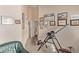 Hallway adorned with framed artwork, with an inversion table at 803 Fetter Ct, Henderson, NV 89052