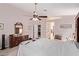 Bright main bedroom with vaulted ceilings and an ensuite bathroom at 803 Fetter Ct, Henderson, NV 89052