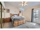Cozy bedroom with a king-sized bed, closet and access to the backyard at 841 Rusty Anchor Way, Henderson, NV 89002
