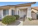 Welcoming front entrance with a decorative security door and lush shrubbery at 841 Rusty Anchor Way, Henderson, NV 89002