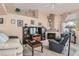 Comfortable living room featuring a fireplace and neutral decor at 841 Rusty Anchor Way, Henderson, NV 89002