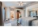 Spacious main bedroom with attached bathroom, walk-in closet, and outdoor access at 841 Rusty Anchor Way, Henderson, NV 89002