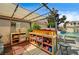Outdoor bar and entertainment area next to a sparkling pool, perfect for relaxation and social gatherings at 947 Rainbow Rock St, Las Vegas, NV 89123
