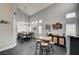 Open concept dining area with high ceilings, modern lighting, and stylish decor at 947 Rainbow Rock St, Las Vegas, NV 89123