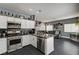 Bright open kitchen featuring modern stainless steel appliances and lots of counter space at 947 Rainbow Rock St, Las Vegas, NV 89123