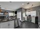 Kitchen with a sink island, stainless steel appliances, and an open view to the living room at 947 Rainbow Rock St, Las Vegas, NV 89123