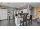 Modern kitchen with stainless steel appliances, granite countertops, and an open layout at 947 Rainbow Rock St, Las Vegas, NV 89123
