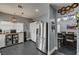 Modern kitchen features stainless steel appliances, ample storage, and stylish gray walls and floors at 947 Rainbow Rock St, Las Vegas, NV 89123