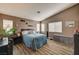 Spacious main bedroom boasting wood flooring and modern decor throughout at 947 Rainbow Rock St, Las Vegas, NV 89123