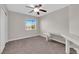 Bedroom features carpet, ceiling fan, and built-in desk at 963 Sable Chase Pl, Henderson, NV 89011