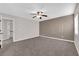 Large bedroom showcasing neutral paint, carpeted floors, and a modern ceiling fan at 963 Sable Chase Pl, Henderson, NV 89011