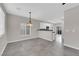Bright dining area featuring tile floors, modern lighting, and access to the kitchen at 963 Sable Chase Pl, Henderson, NV 89011