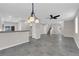Open-concept layout with tile floors, ceiling fan, and ample natural light at 963 Sable Chase Pl, Henderson, NV 89011