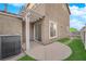 Spacious outdoor patio is perfect for entertainment, set near a lush, green lawn at 963 Sable Chase Pl, Henderson, NV 89011