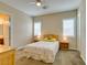 Comfortable bedroom with neutral walls, plantation shutters, and a ceiling fan for added comfort at 9731 Addie Meadow Ct, Las Vegas, NV 89149