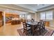 Open-concept dining area with tile floors and recessed lighting adjacent to the modern kitchen at 9731 Addie Meadow Ct, Las Vegas, NV 89149