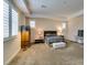 Spacious main bedroom with natural light, plantation shutters, and a cozy seating area at 9731 Addie Meadow Ct, Las Vegas, NV 89149